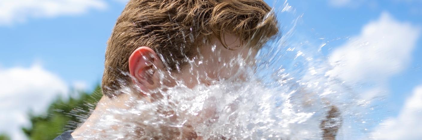 Student bursts water balloon in his face.